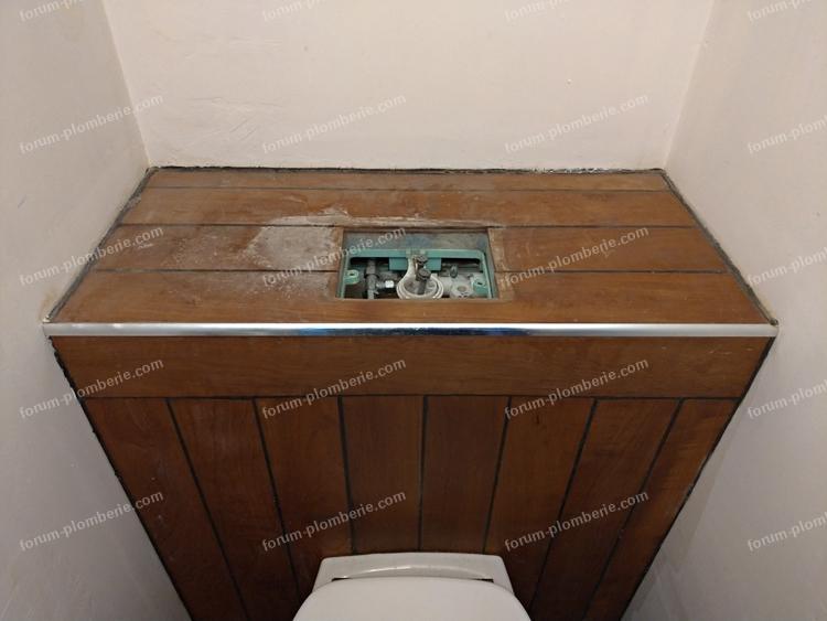 acceder à une chasse d'eau encastrée