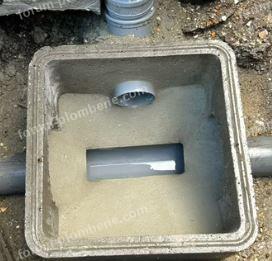 regard avec cunette en béton